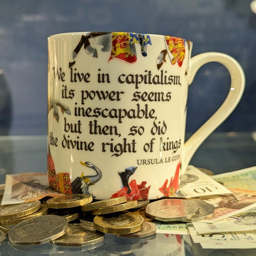 We Live in Capitalism... Ursula Le Guin Mug